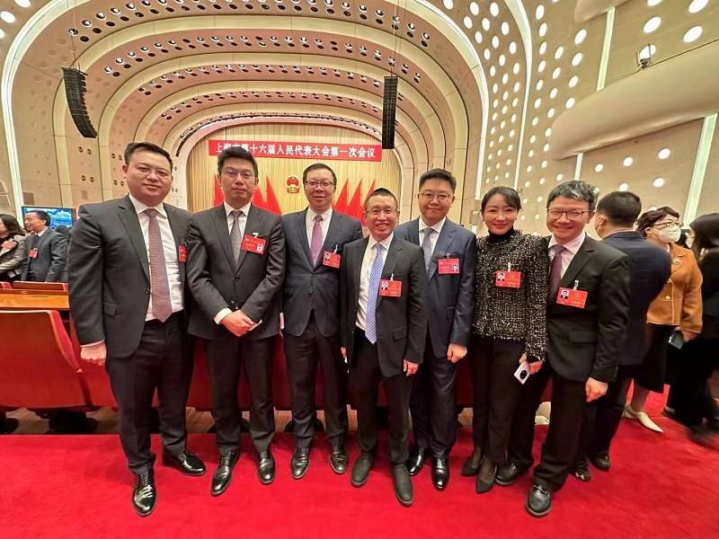 Chairman Liu Wei (far right) attends the conference in Shanghai.